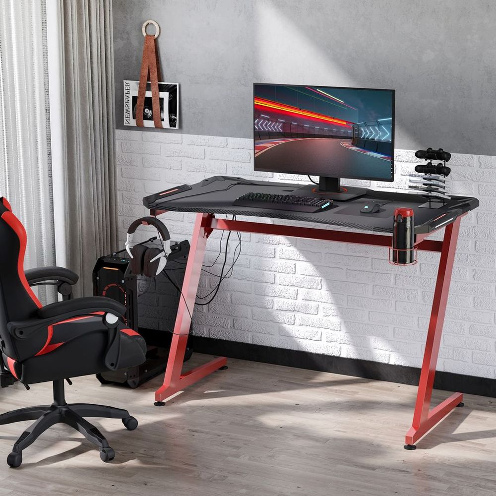 Ultimate Gaming Desk: Sleek Design with Cup Holder, Headphone Hook & Storage